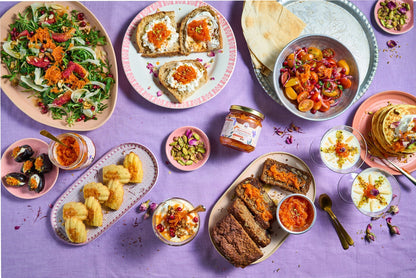 Gerechten met Wortel Wonder op een lila tafelkleed - Vers van de Pers Food